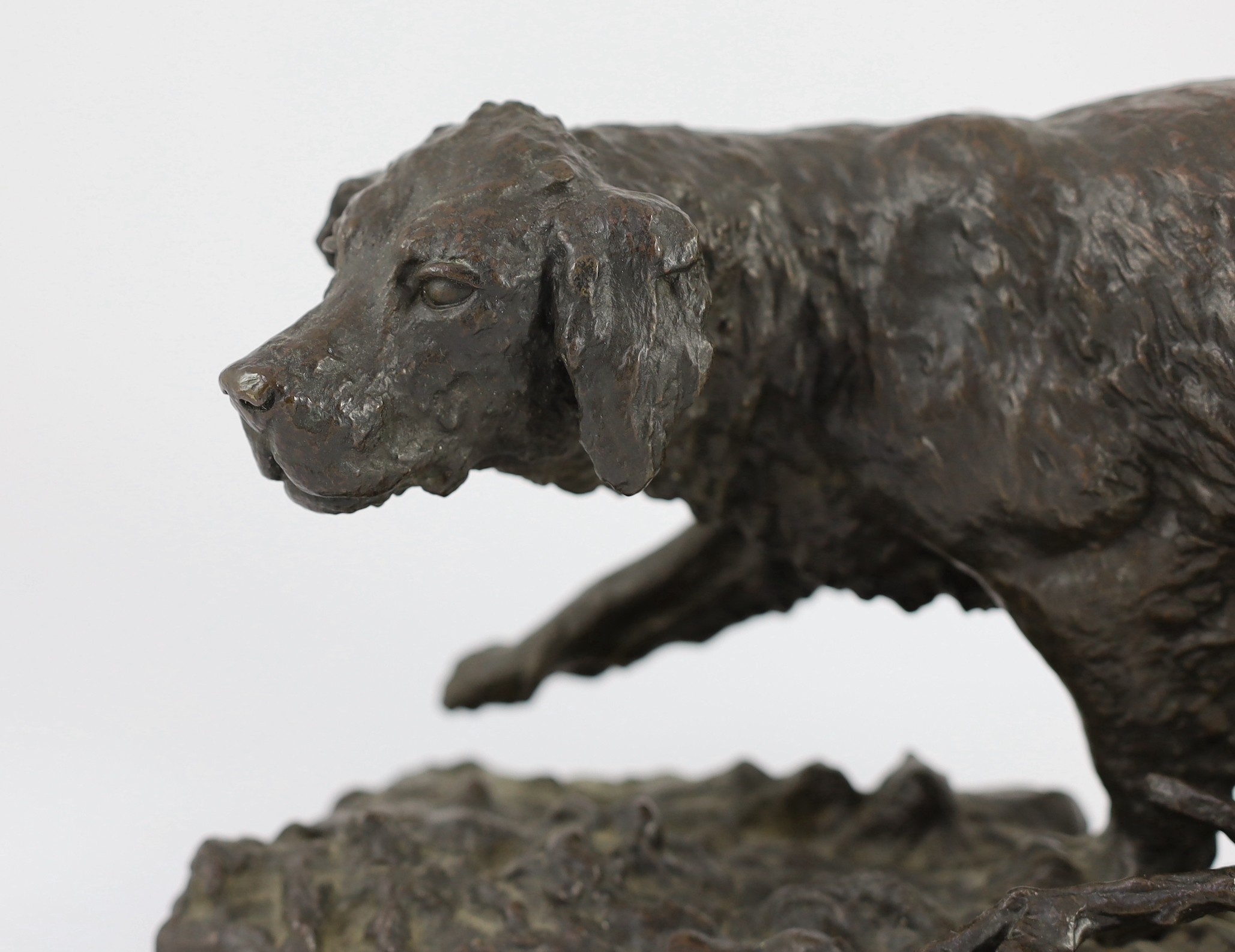 After Christopher Fratin (1801-1864). An Animalier bronze figure of a retriever, 19cm high 41cm long